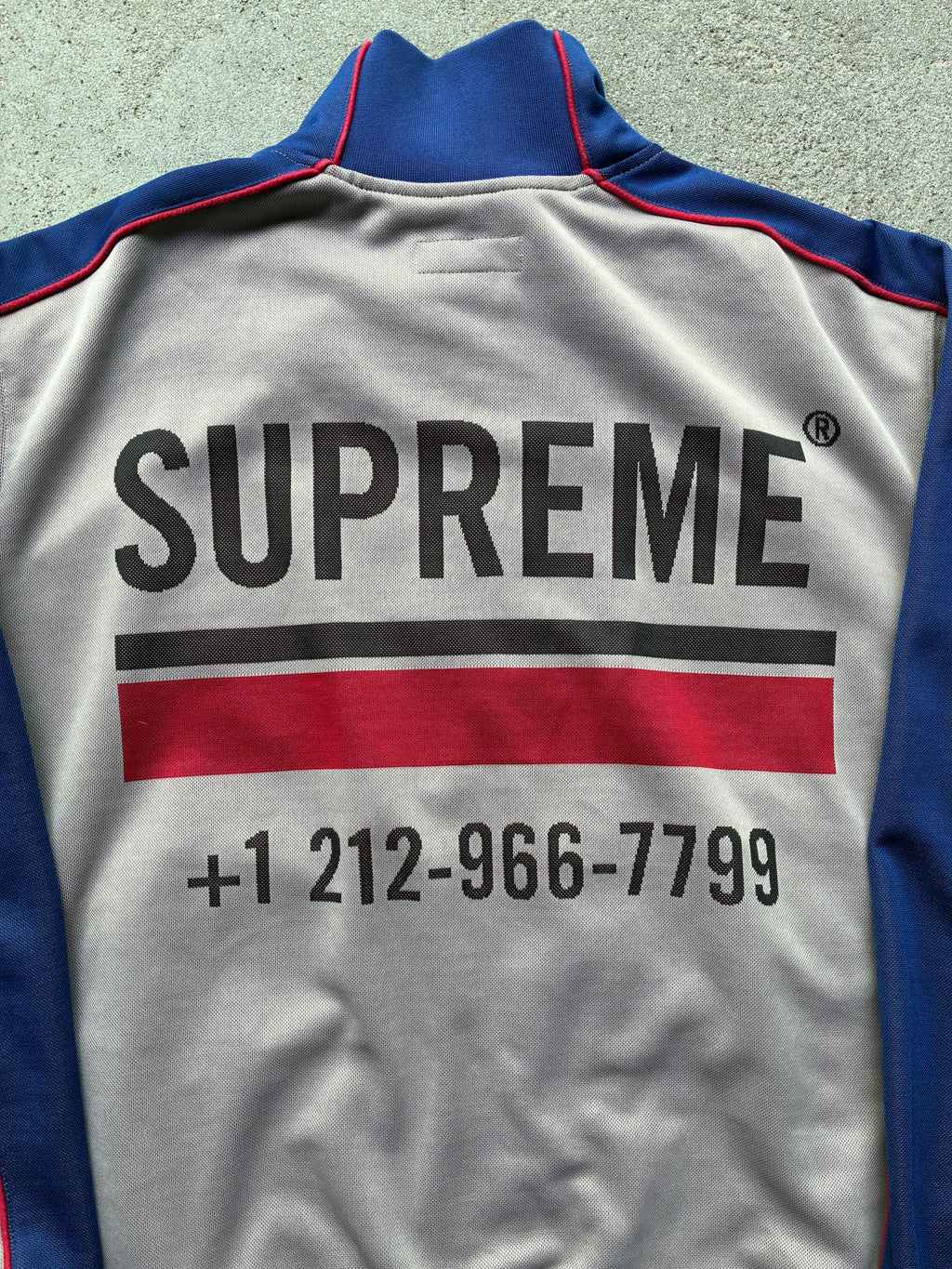 Supreme “WORLD FAMOUS” Track jacket (L)