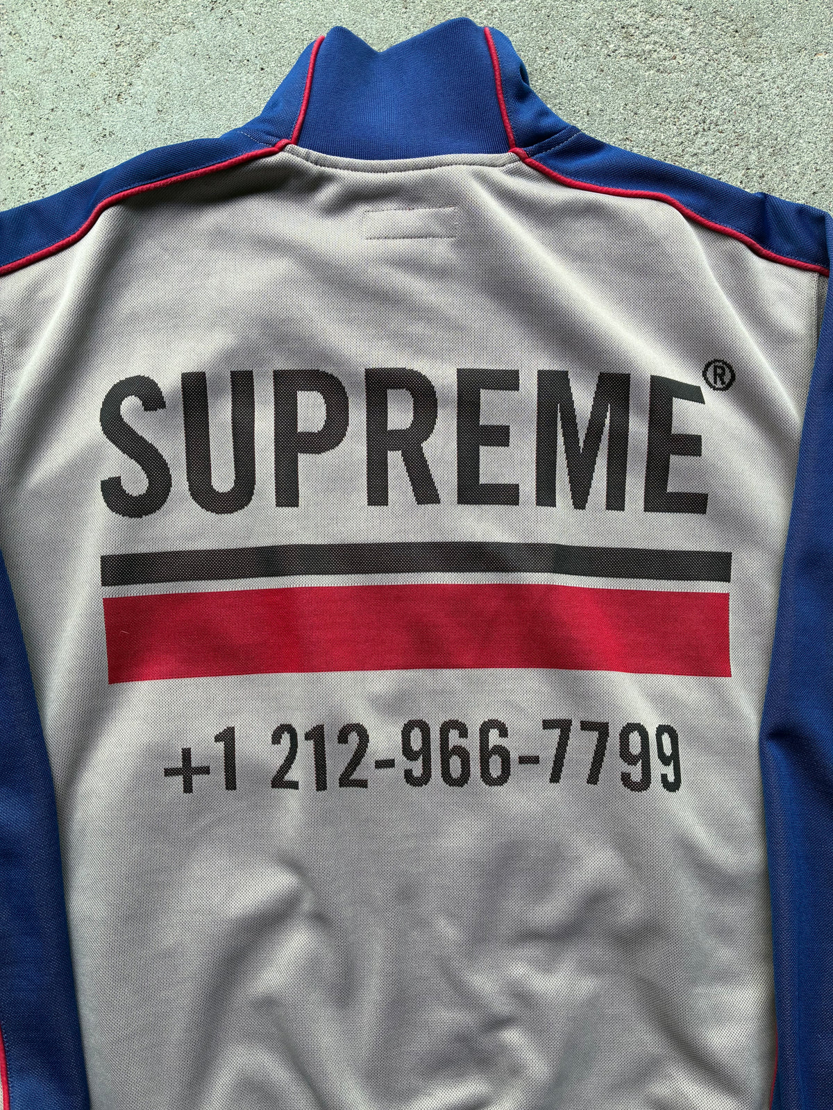 Supreme “WORLD FAMOUS” Track jacket (L)