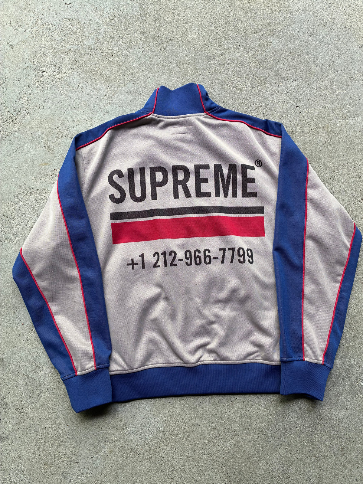 Supreme “WORLD FAMOUS” Track jacket (L)
