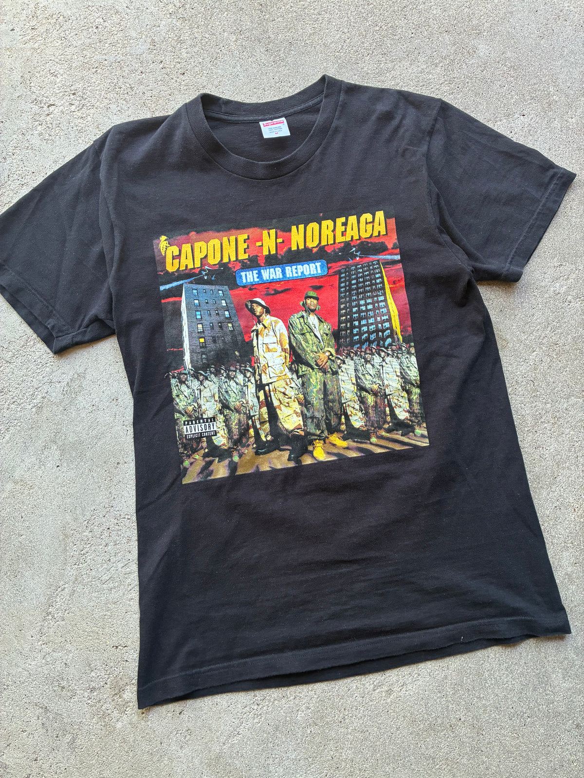 Supreme “WAR REPORT” Tee (M)