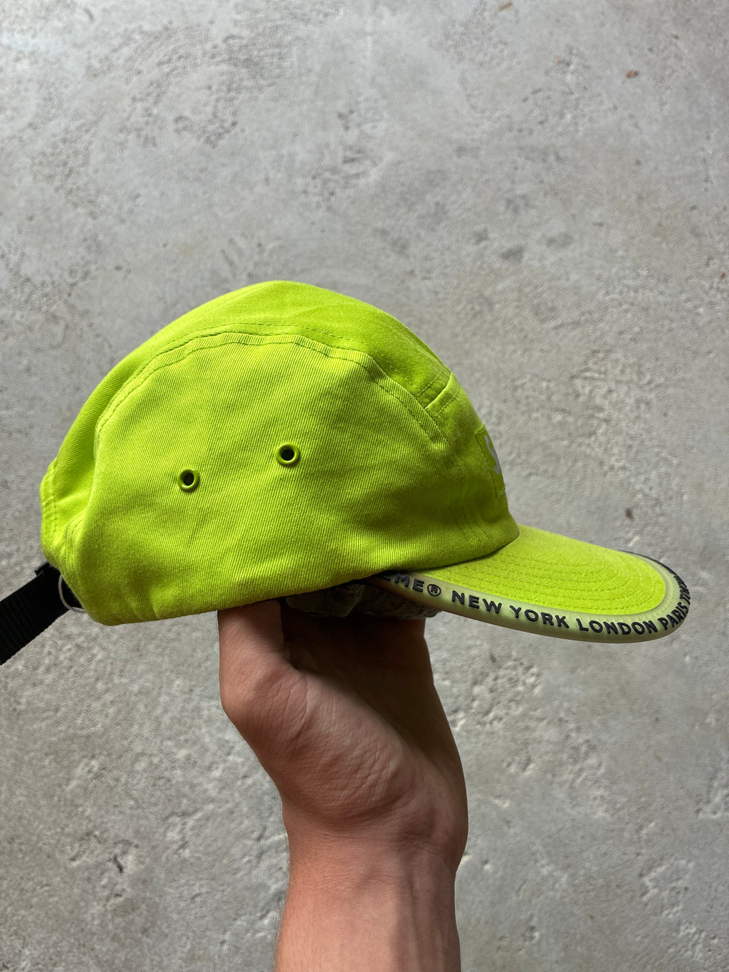 Supreme “WORLDWIDE VISOR TAPE” Camp Cap (Adjustable)
