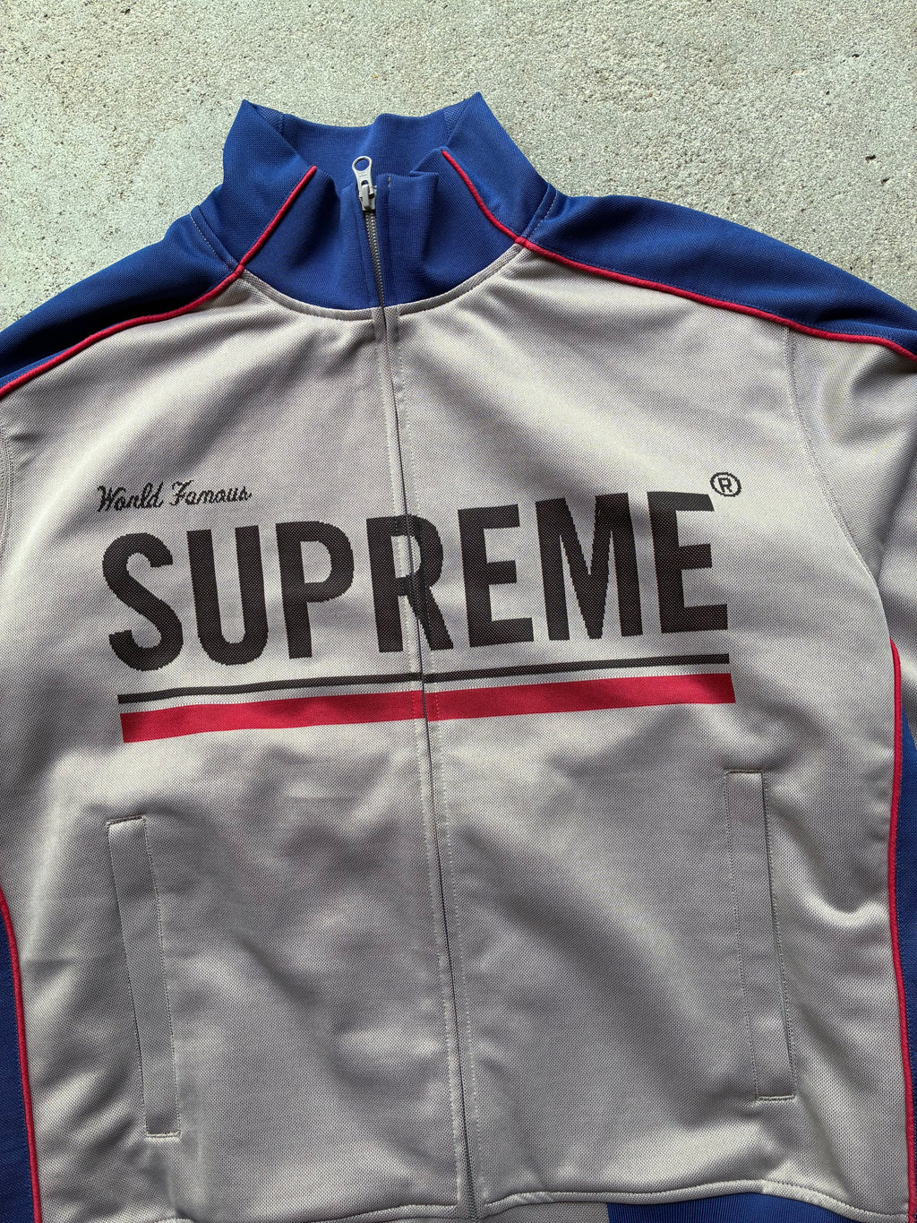 Supreme “WORLD FAMOUS” Track jacket (L)