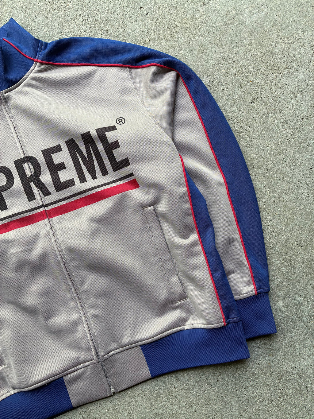 Supreme “WORLD FAMOUS” Track jacket (L)
